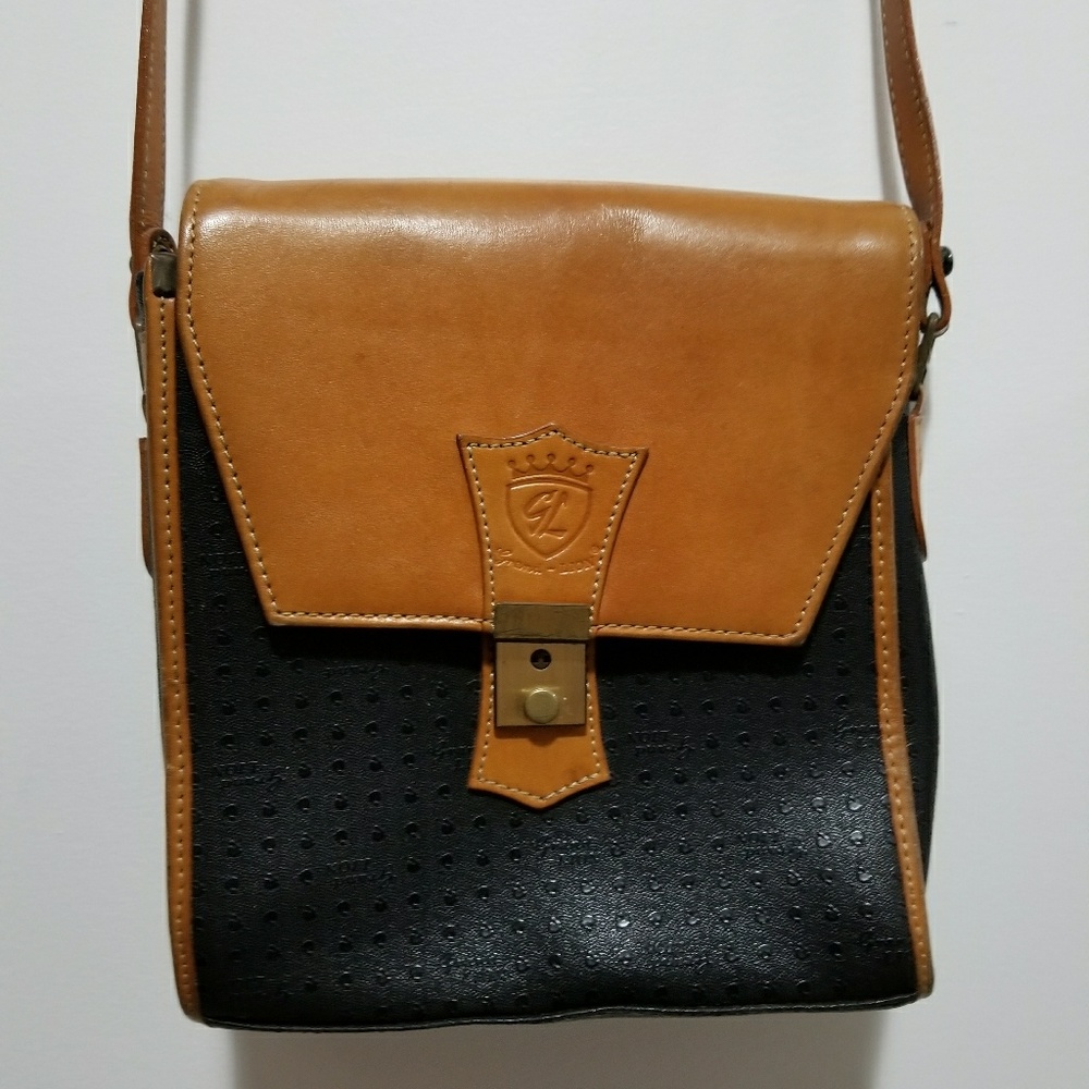Vintage Grand Lion leather saddle/messenger purse